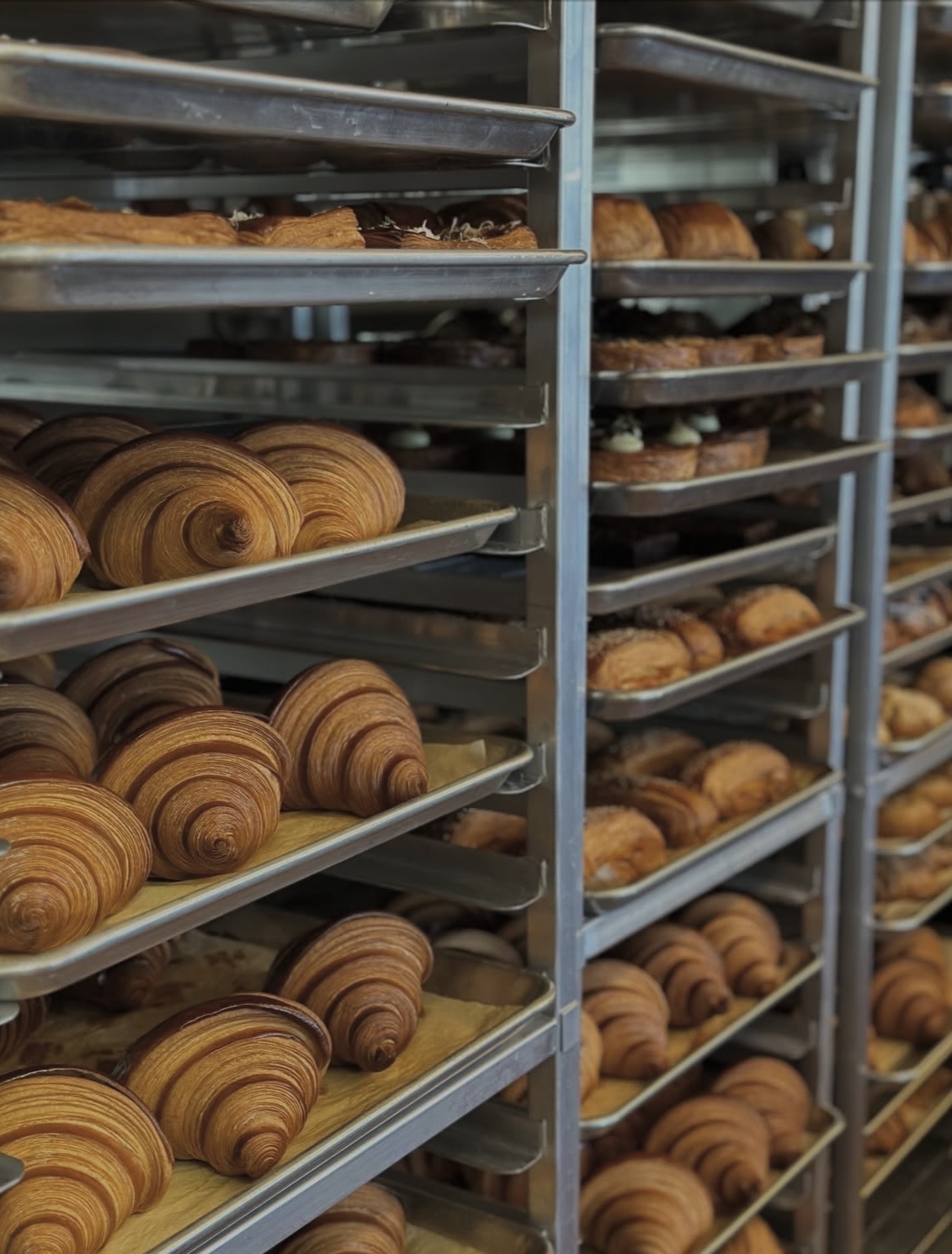 Racks of fresh croissants